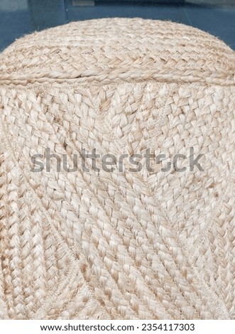 Hand woven natural fabric jute pouf.