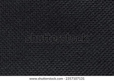 Black cloth material texture flat macro close up view