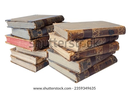 Piles of old books isolated on a white background