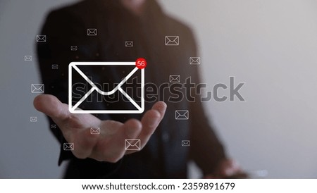 Businessman using smartphone with new email notification for business e-mail communication and digital marketing. Inbox receiving electronic message alert internet technology.