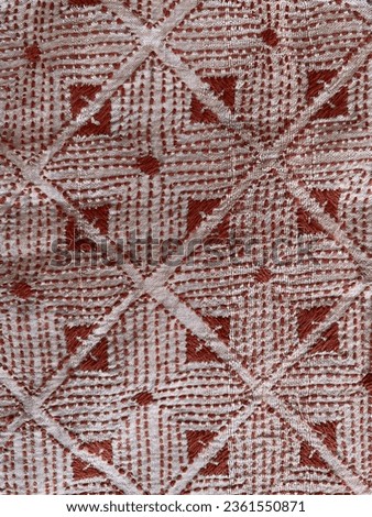Rust geometric Kantha hand embroidery on beige silk fabric 