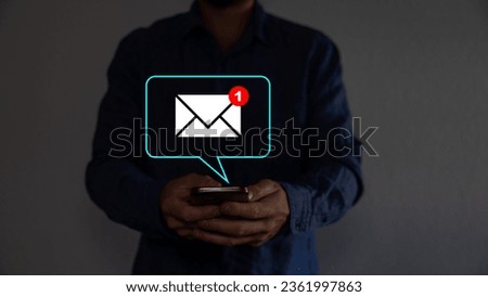Hand of businessman touching new email notification for business e-mail communication and digital marketing. Inbox receiving electronic message alert internet technology.