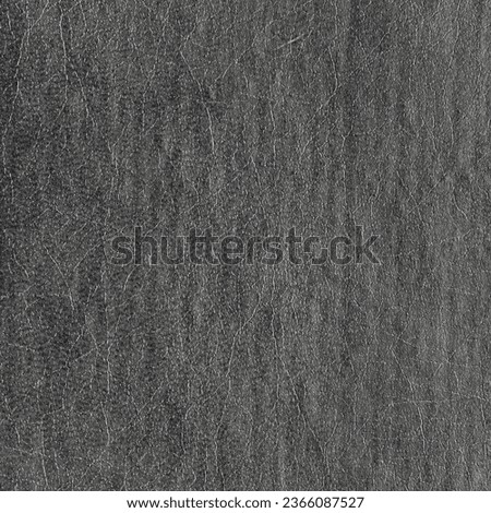 Synthetic dark gray, black color leather for background. Close-up texture decoration material, grey pattern background for rectangular color design