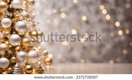 Christmas tree with gold and white baubles, bokeh background