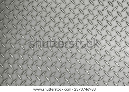 Industrial shiny metal silver list with rhombus shapes as design background