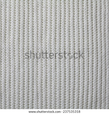 Knitting pattern from light  woolen warm soft yarn for background