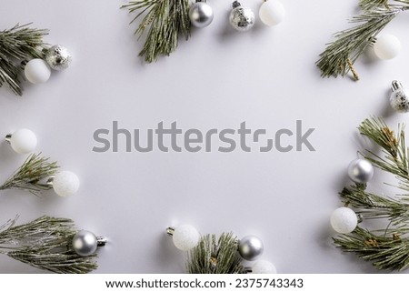 Christmas baubles decorations with copy space on white background. Christmas, decorations, tradition and celebration concept.