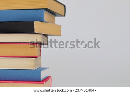 Colored books on white background