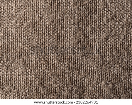 brown wool fabric texture useful as a background