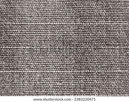 Beige raw cotton fabric for natural textile background.