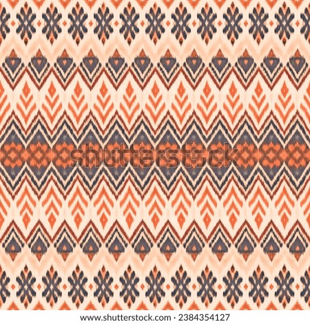 Ikat Ethnic geometric seamless pattern.Ethnic geometric seamless in Ikat design for textile,fabric and textures. Ikat Ethnic geometric pattern for hand drawn style seamless background.Hand drawn Ikat.