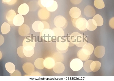 Background with abstract golden sparkling christmas lights. Bokeh effect. Defocused. Template mock up for holiday card. Copy space for text