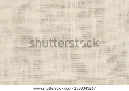 Beige color texture of sackcloth yarn macro close up view