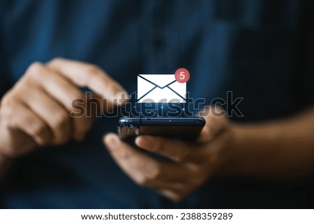 Man using smartphone for checking email notification