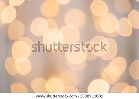 Abstract festive Christmas golden lights bokeh. Defocused, sparkling elements. Template for holiday new year card, copy space for text