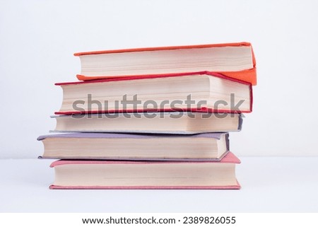 Composition with hardcover books, Books stacking, isolated on white background. Back to school. Copy Space. Education background