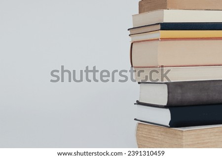 stack of books on gray background. high quality photo