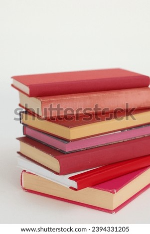 Red books on white background