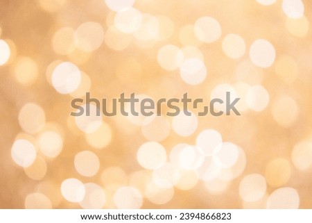 Abstract light gold bokeh background.
Abstract bokeh on a light gold background. 
Abstract christmas background with bokeh. 
Abstract background with bokeh.