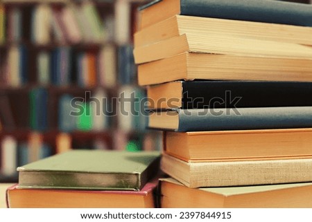 books on table in library, space for text
