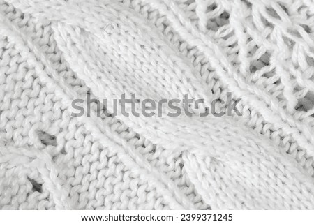 Details of knitted woolen fabric. White textile background. Woolen Texture Background, Knitted Wool Fabric, Hairy Fluffy Textile
