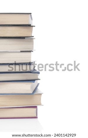 Stack of books close up on a white background