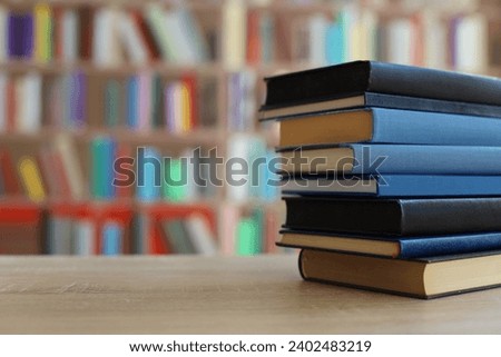 Blue books on table in library