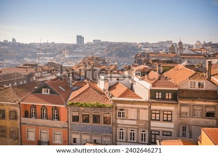 An aerial view of the beautiful cityscape of Porto, Portugal on a sunny day