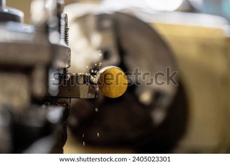 close up of machine operation for Metal Lathes. The steel column rolling in machine. metalworking industry. finishing metal working internal steel surface on lathe grinder machine with flying sparks