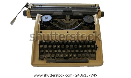 Manual typewriter. It is a device with a set of buttons that, when pressed, causes letters to be printed on a document, usually paper.