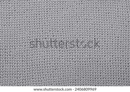 texture of grey knitted sweater.