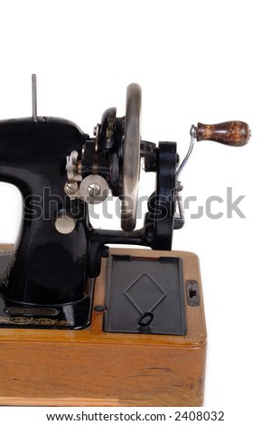 Old sewing machine. Taken on white background.
