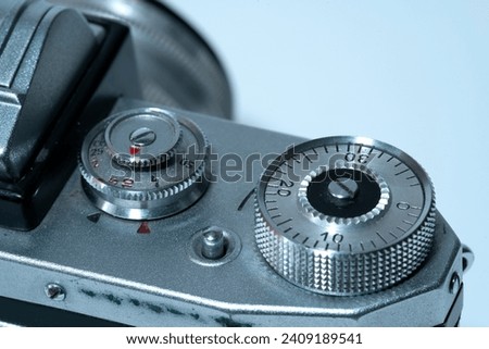 Close-up of the exposure time dials on an analog camera