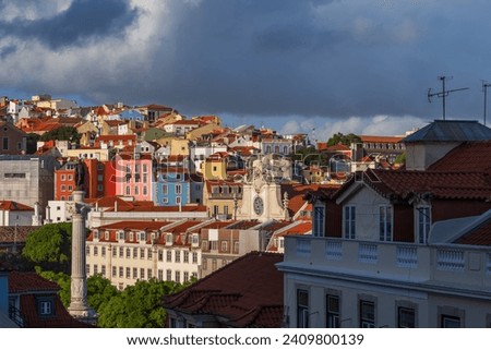 City of Lisbon skyline around Rossio Square with colorful houses in Portugal.