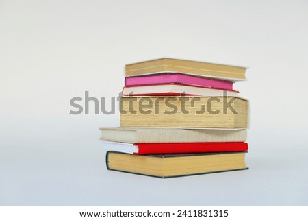 stack of books on white