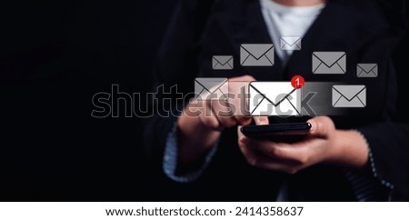 Woman hand use smartphone with new email alert sign icon pop up. Communication business technology.