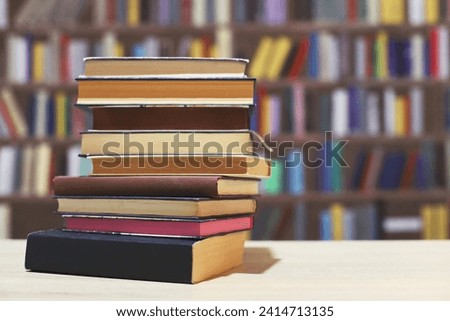 stack of books on the shelf in library. education background