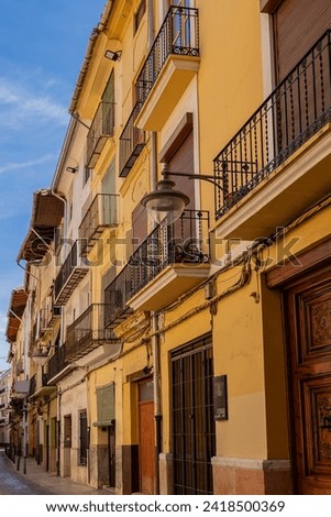 Scenic view of typical traditional houses on the streets of Xativa (Jativa) old town. Xativa, Spain, Europe.