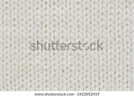 White soft woolen sweater surface texture as background