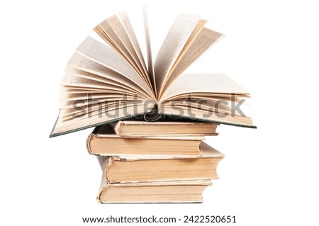 stack of old books isolated on white background