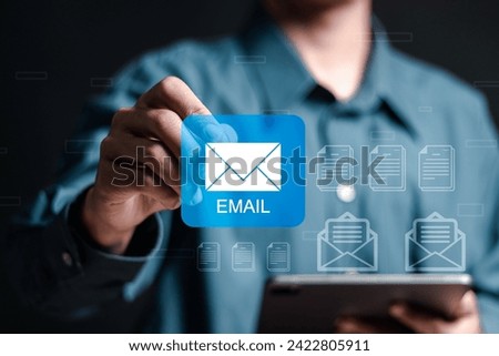 Email marketing concept. Businessman use tablet sending many e-mails or digital newsletter to customers. Direct selling projects in business List of customers who want to send by email.