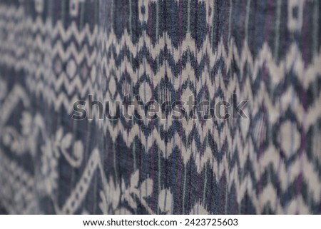 Woven motif on sarong. Batik cloth pattern