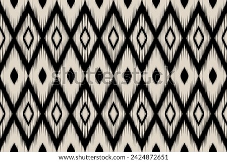 Seamless ethnic design, ikat art. beautiful hand drawn Design for textile and printing