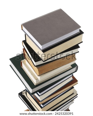 Stack of many different books isolated on white