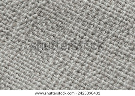 Texture of soft light grey fabric as background, top view