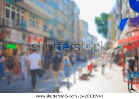 Blur texture background for design. Out of focus views of the streets of an eastern city on a sunny summer day