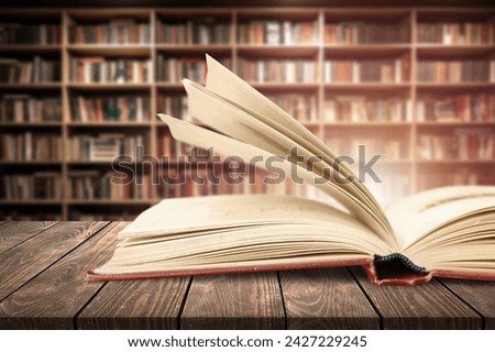 Book with opened old pages in library.