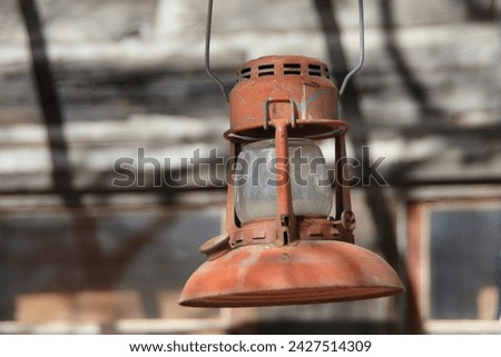 A unique style vintage kerosene lantern.