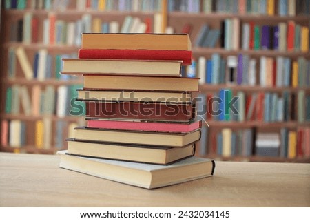 many colorful books on the shelf in the library, Books by the world's best writers, bestsellers