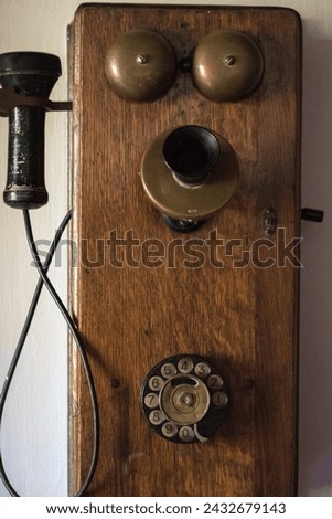 Closeup of an old wooden telephone